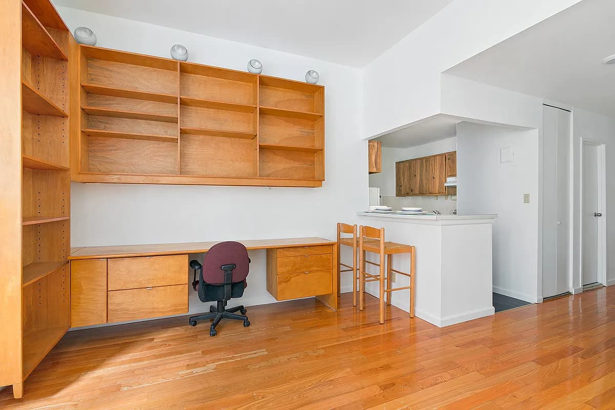 Floor-to-ceiling built-ins in every corner. Functional, not mine.